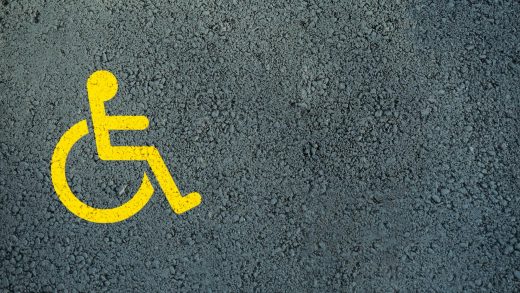 wheelchair pictograph on asphalt