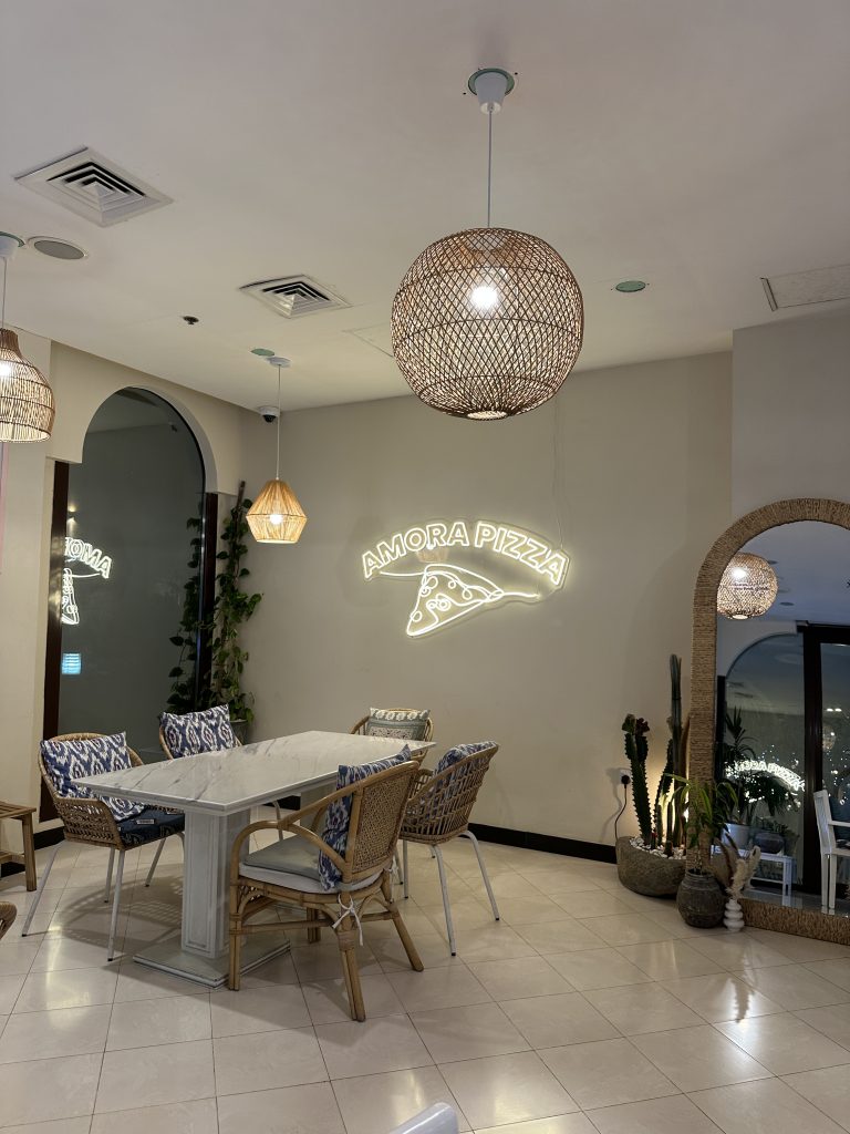 Indoor view at Amora Pizza in Lusail, Qatar.