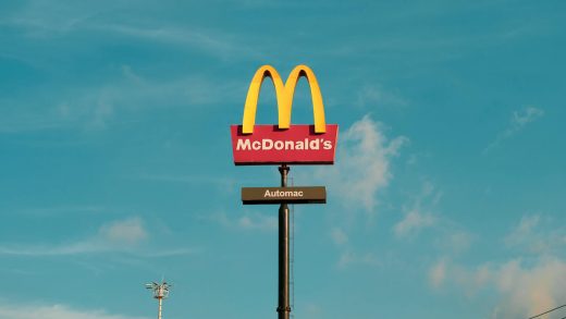 blue sky over a mcdonald s sign