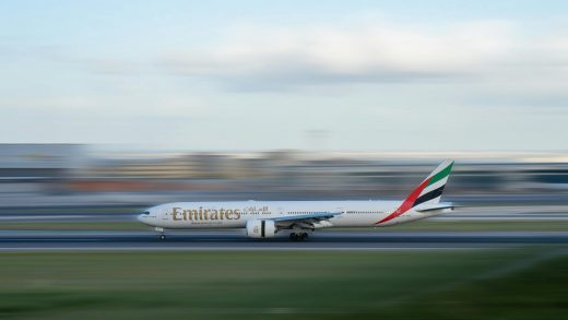 Emirates airlines airplane on DXB runway in Dubai